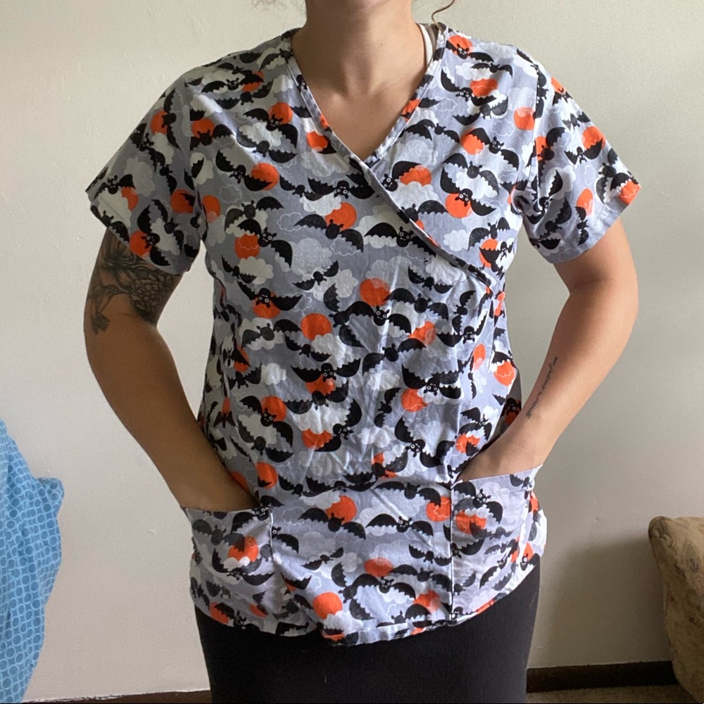 Batty decorative scrubs top